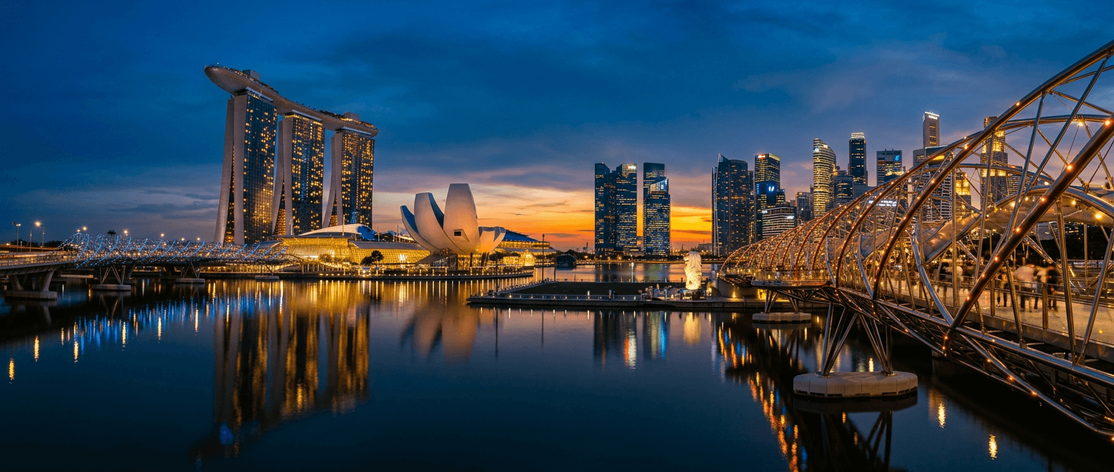 Marina Bay Sands, the Helix Bridge and the Singapore skyline at dusk